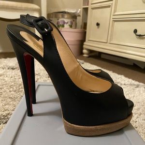 100% authentic Christian Louboutin black leather slingbacks!